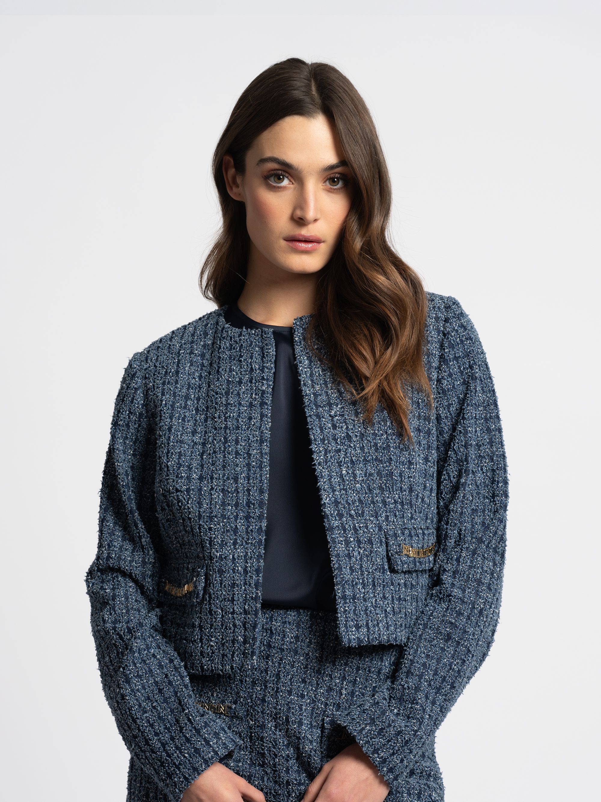 Tweed jacket with chain details
