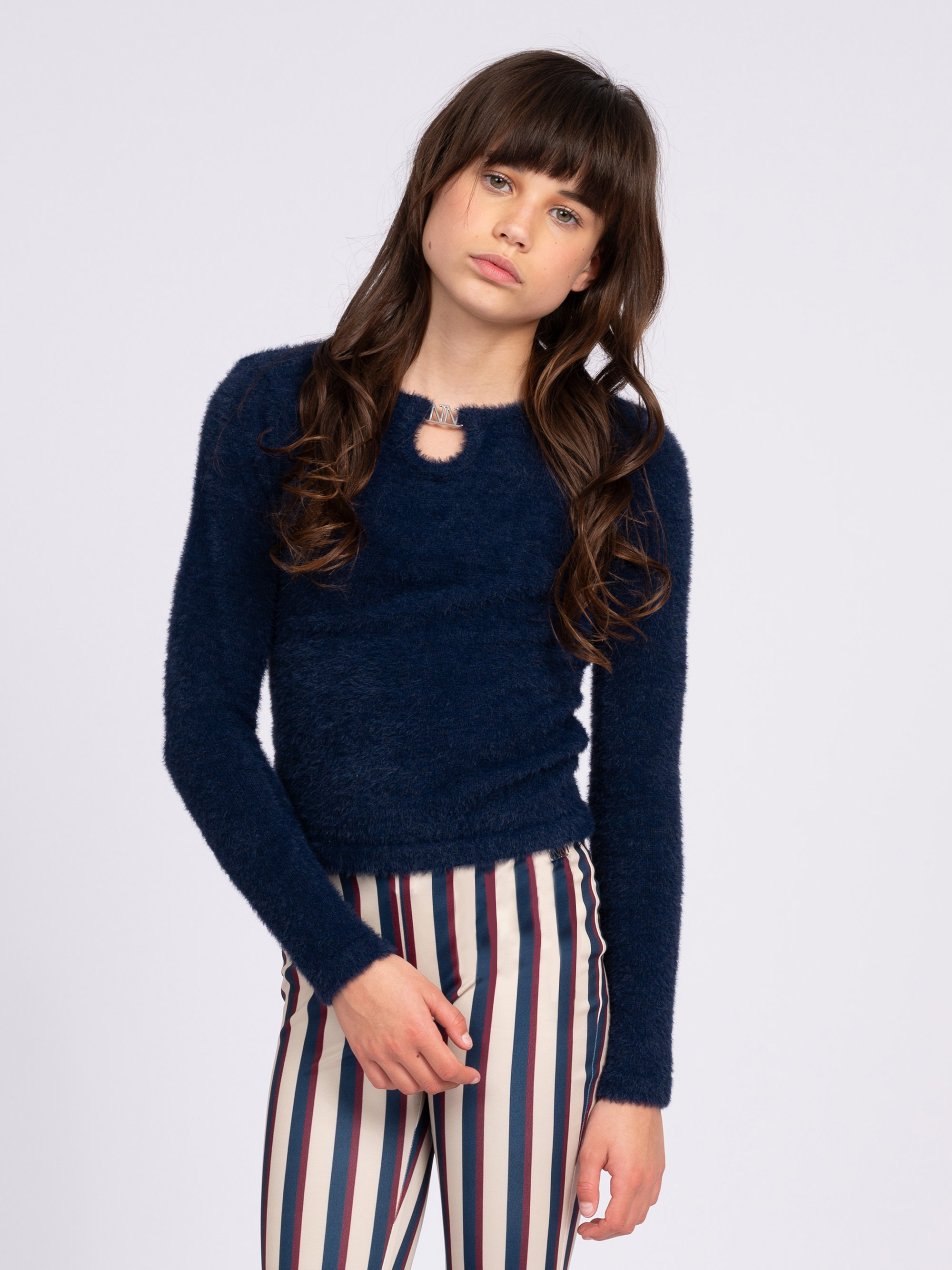 Fluffy sweater with detail at the neck
