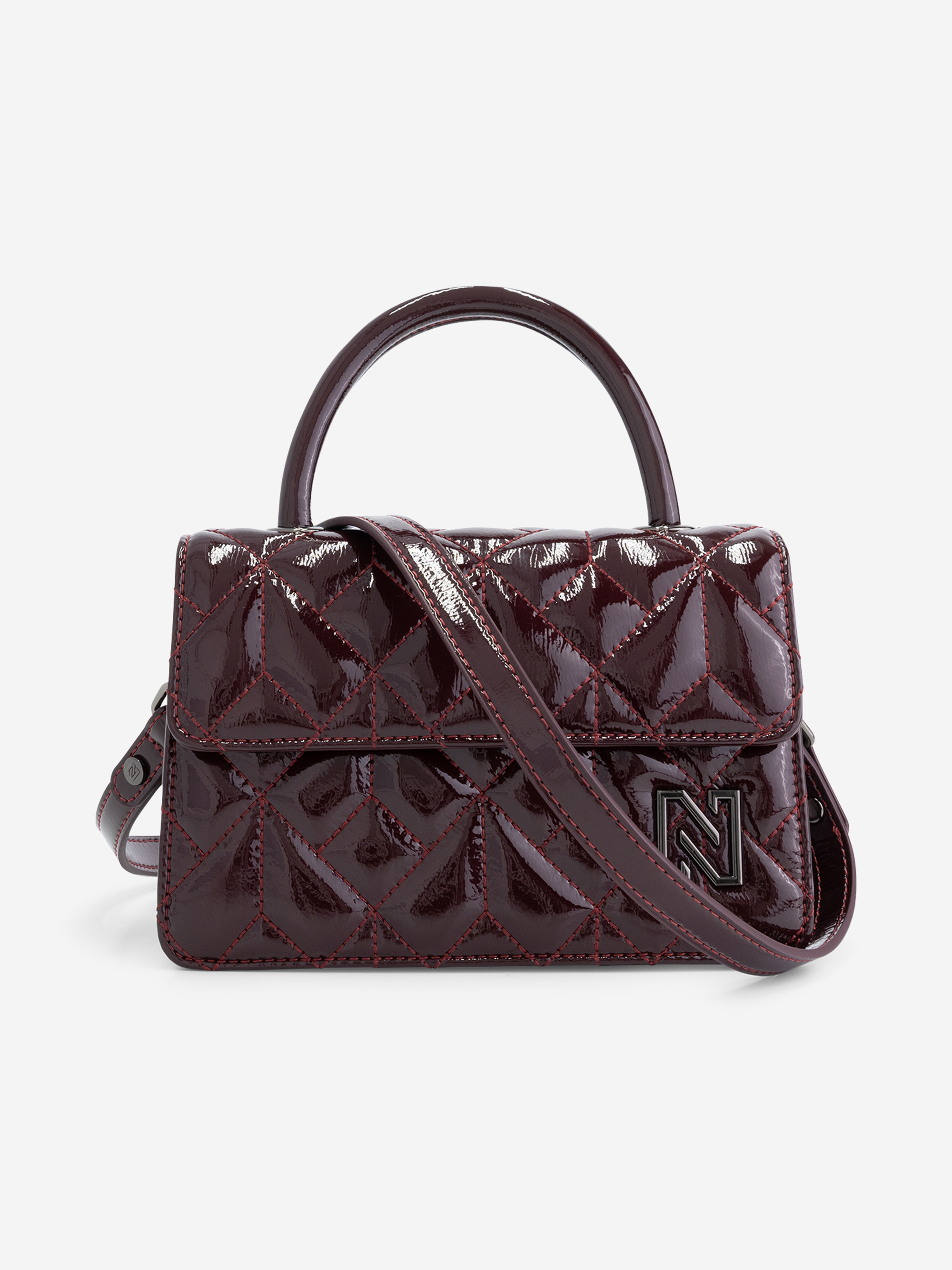 Quilted lacquer handbag