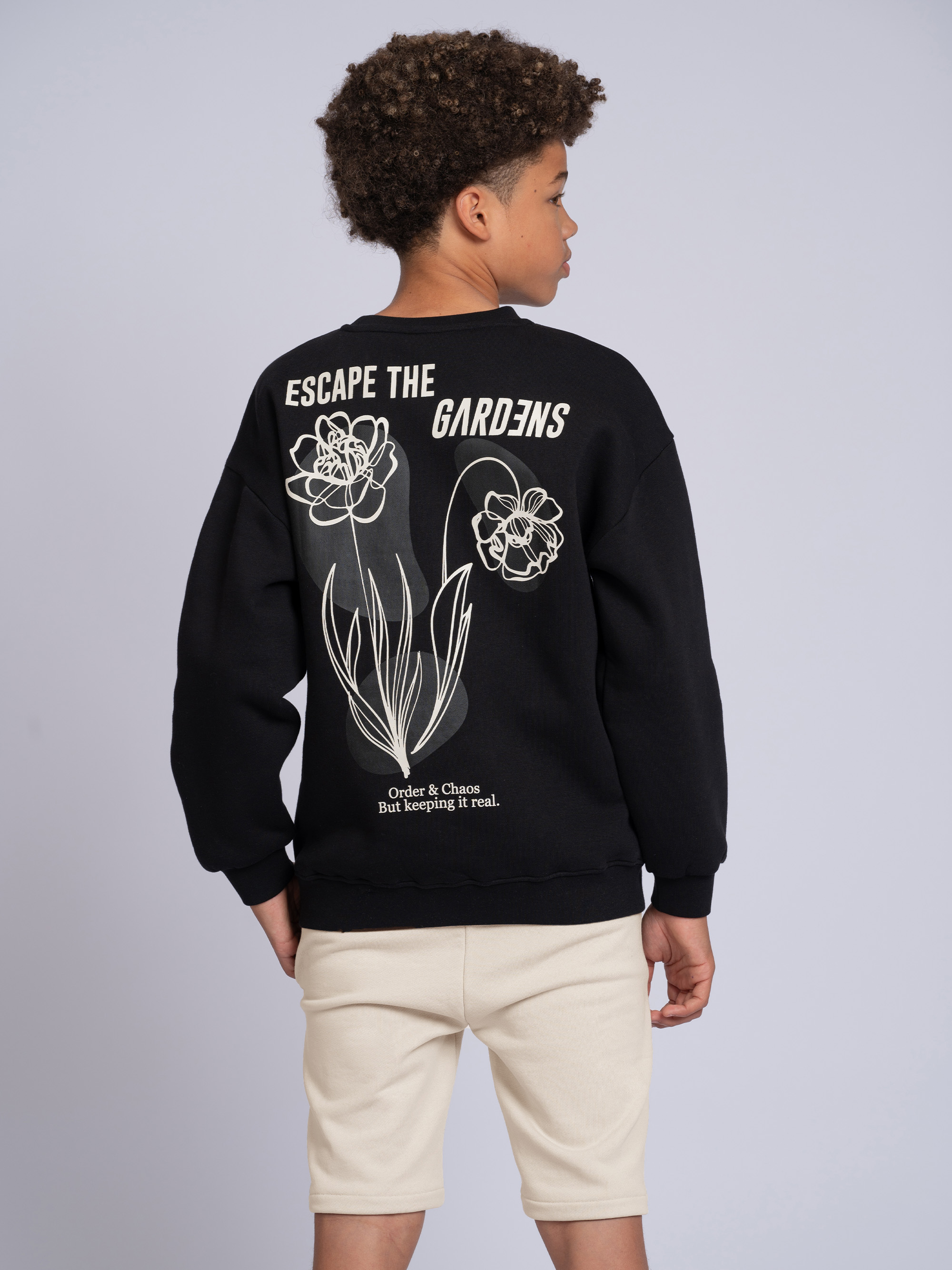Oversized sweater with graphic print on the back