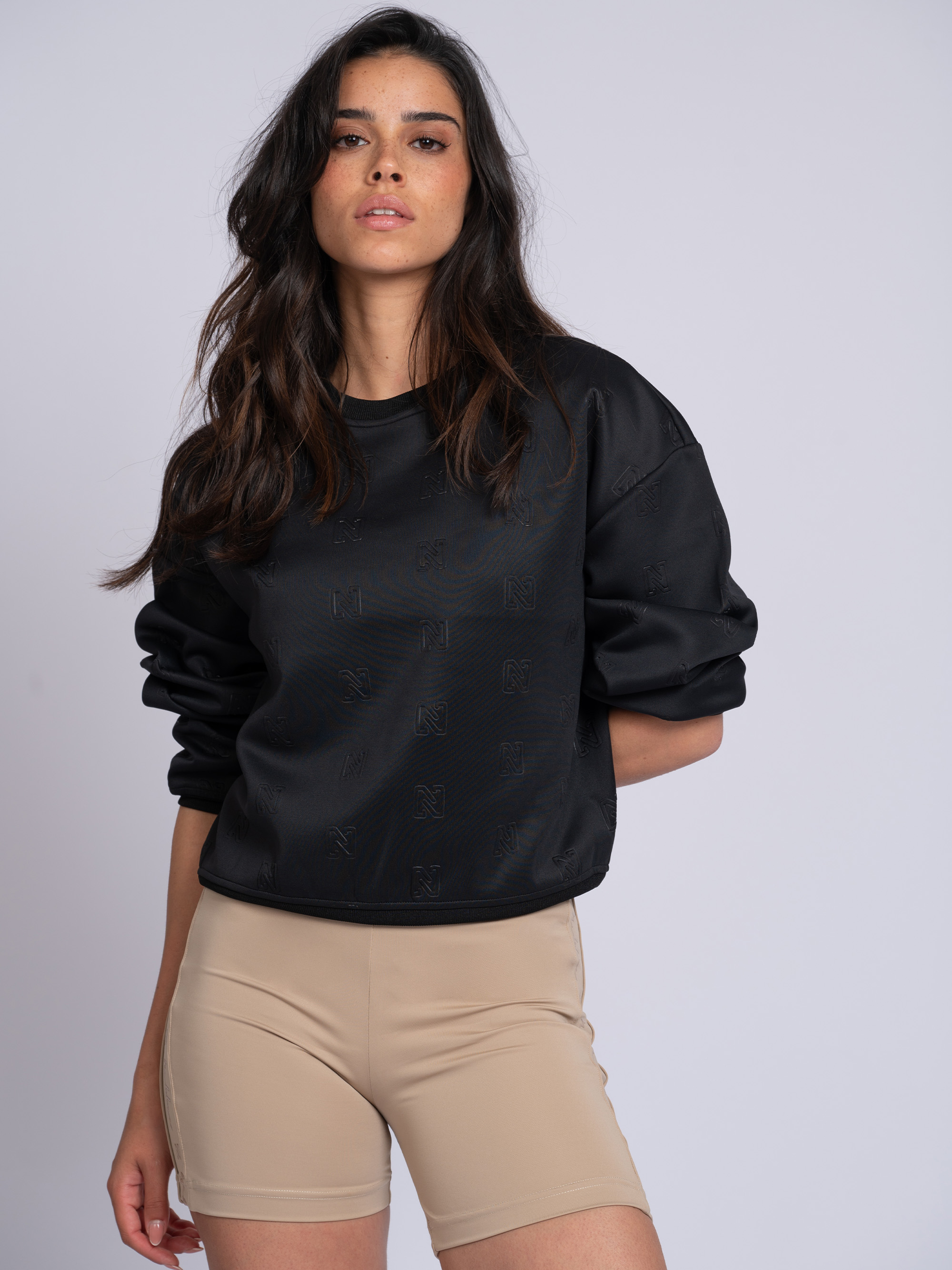 Loose-fitting sweater with logo pattern