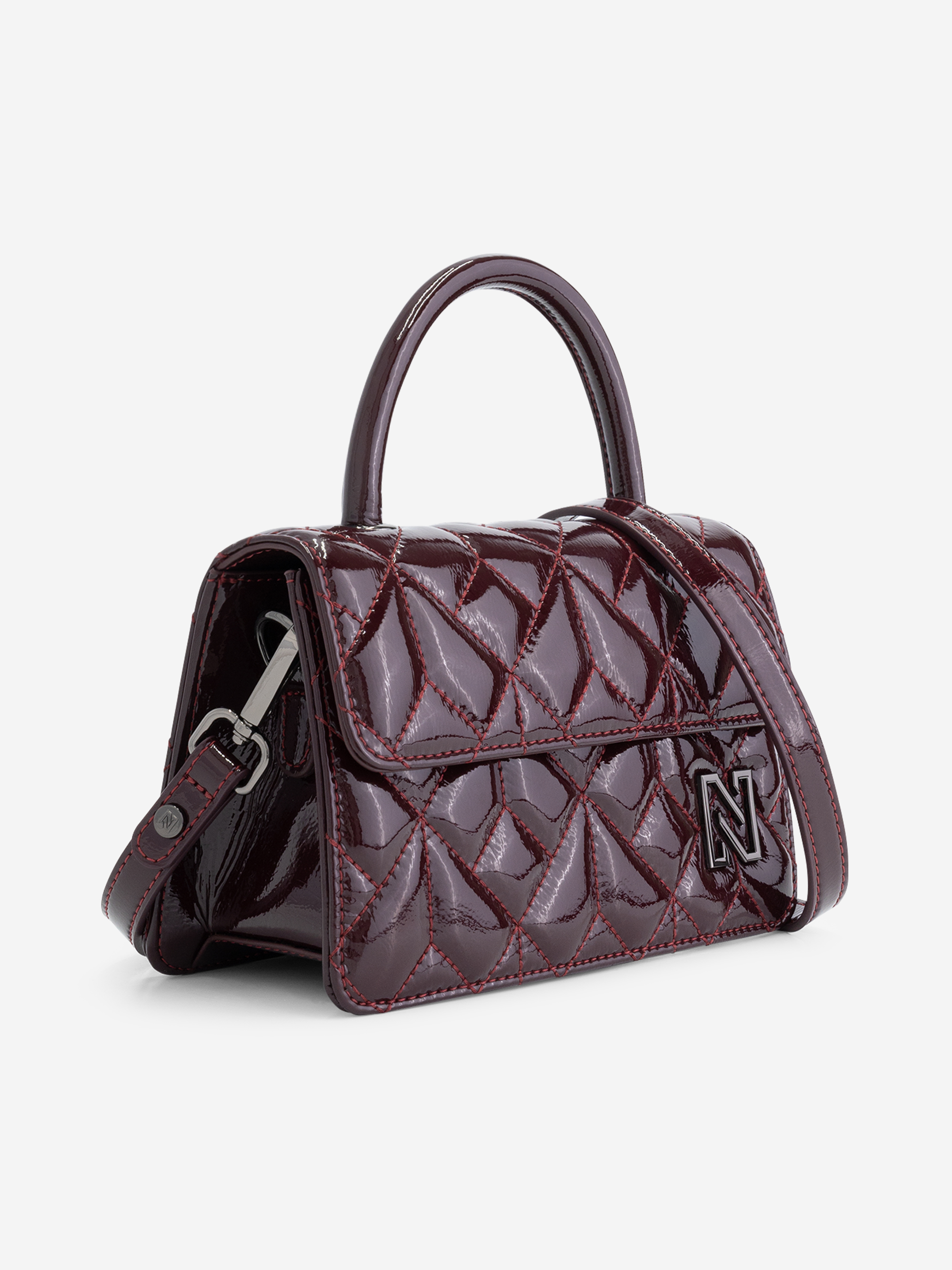 Quilted lacquer handbag