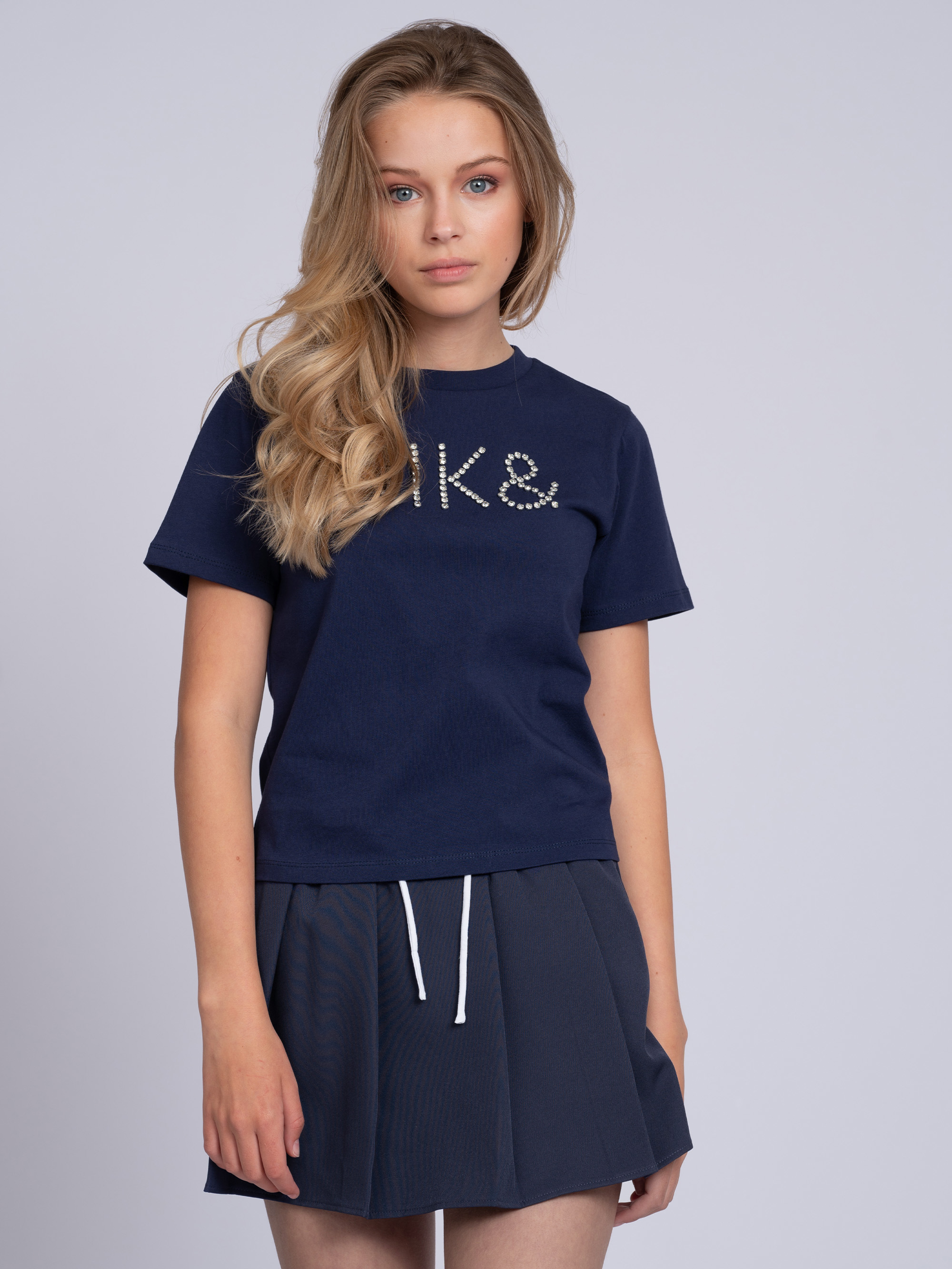 Short skort with pleats and double waistband