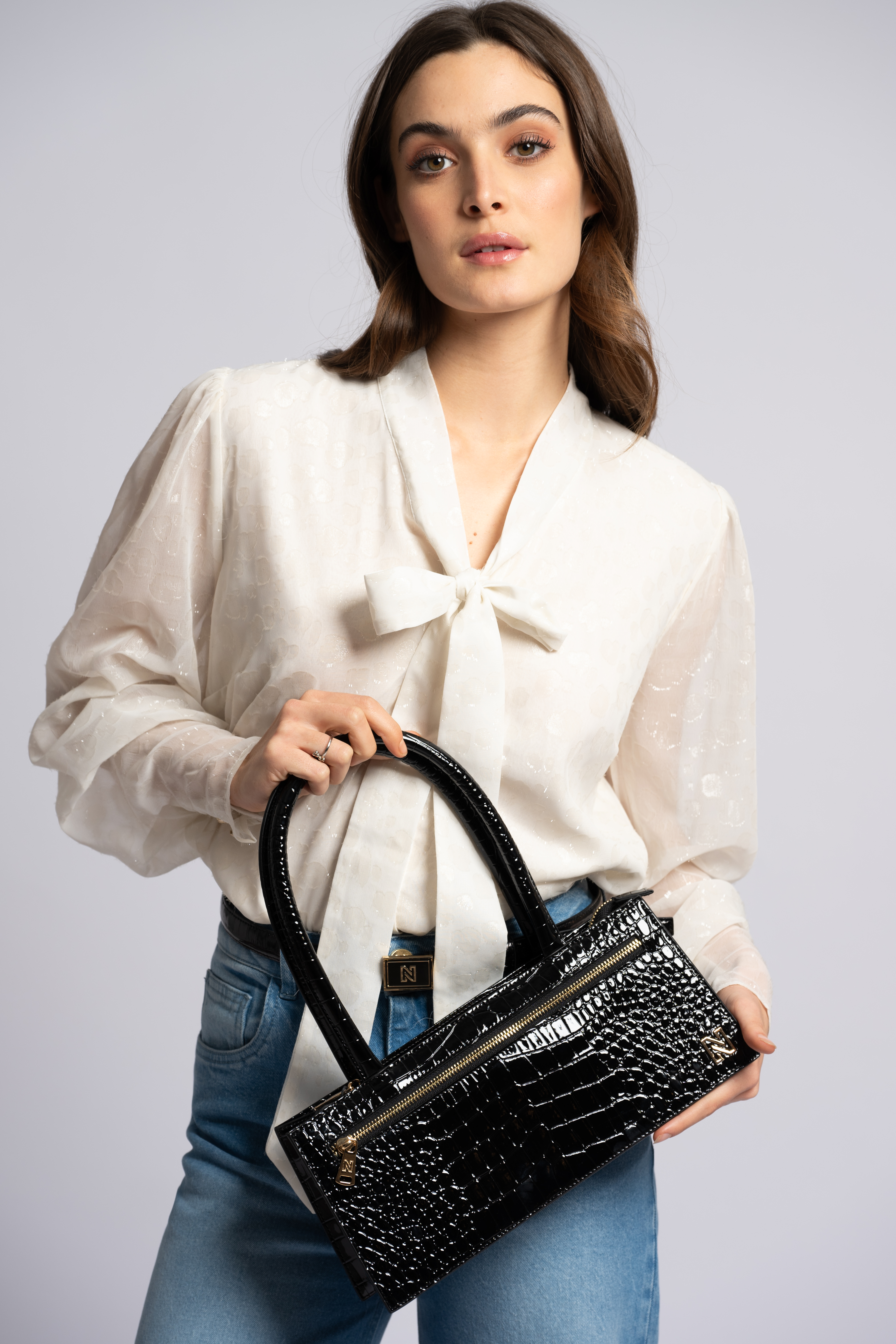 Blouse with tie closure at neck